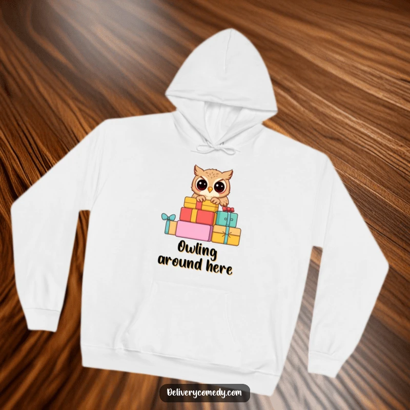 Funny curious owl hoodie, depicting a wise owl peering curiously from a stack of colorful parcels.
